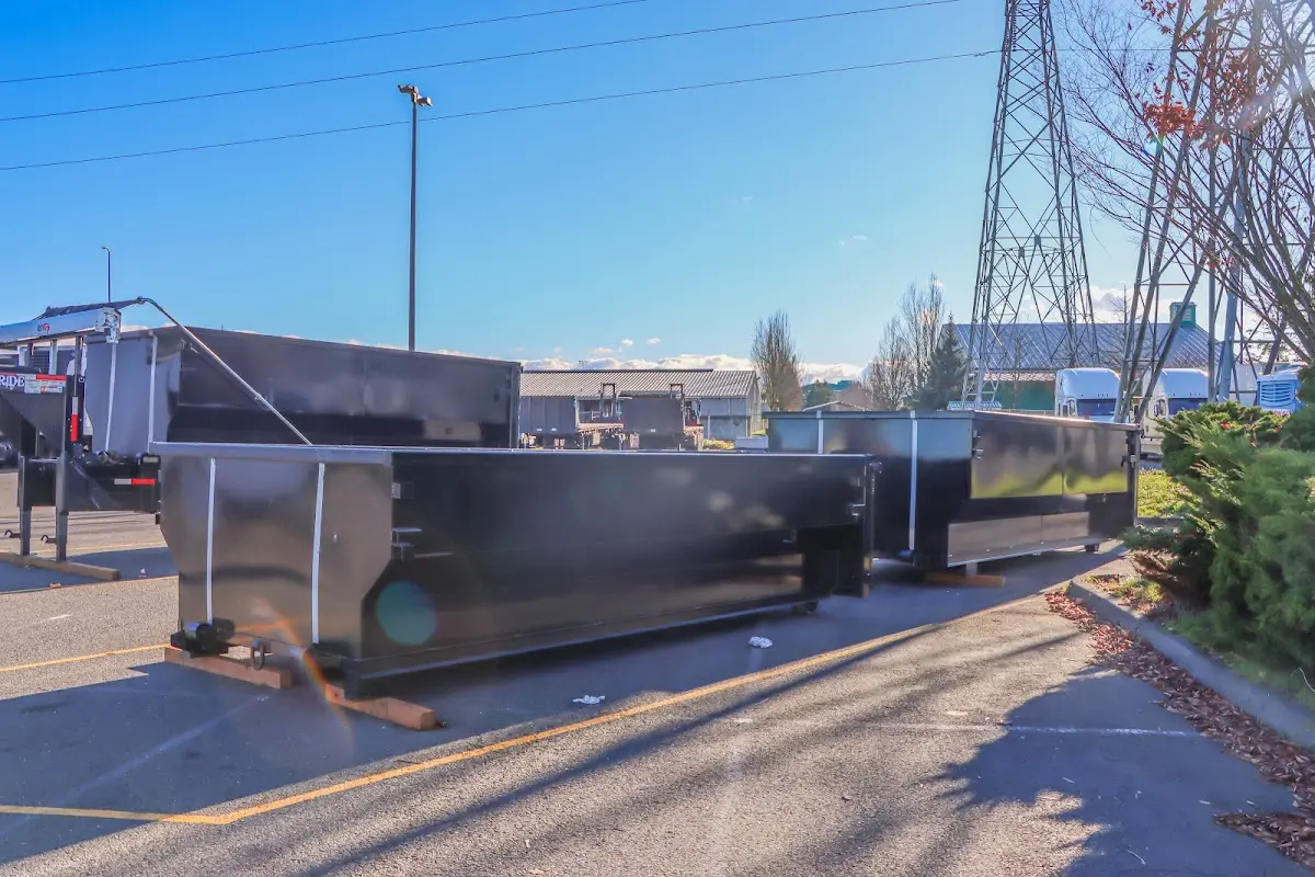 Roll-off dumpster ready for waste disposal at job site for 2 Yard Dumpster Rental in Springfield
